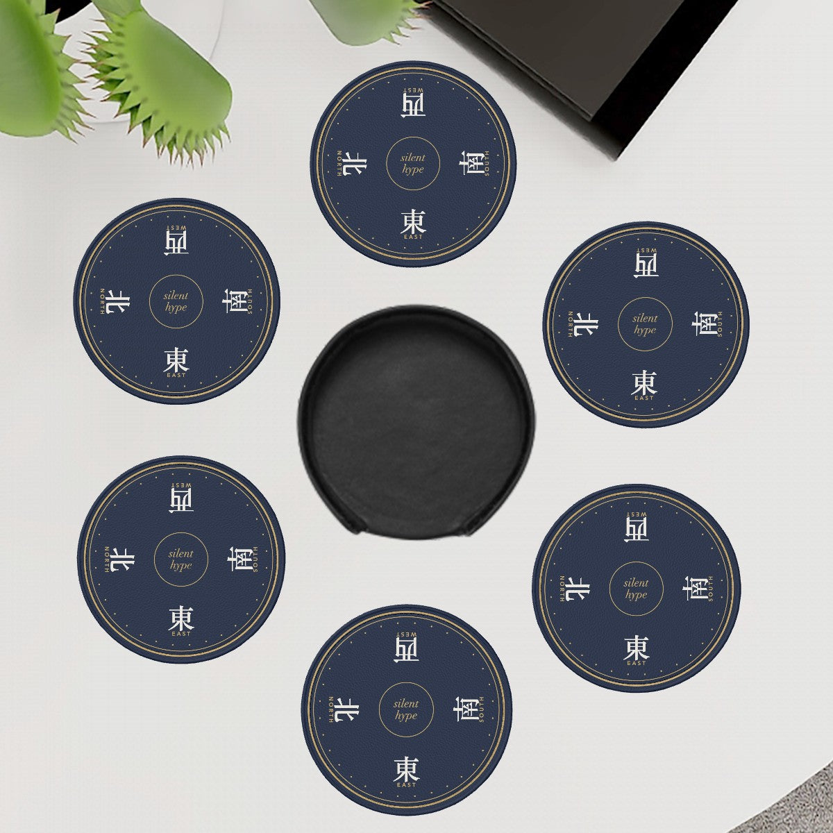 Six seat winds mahjong coasters around their holder