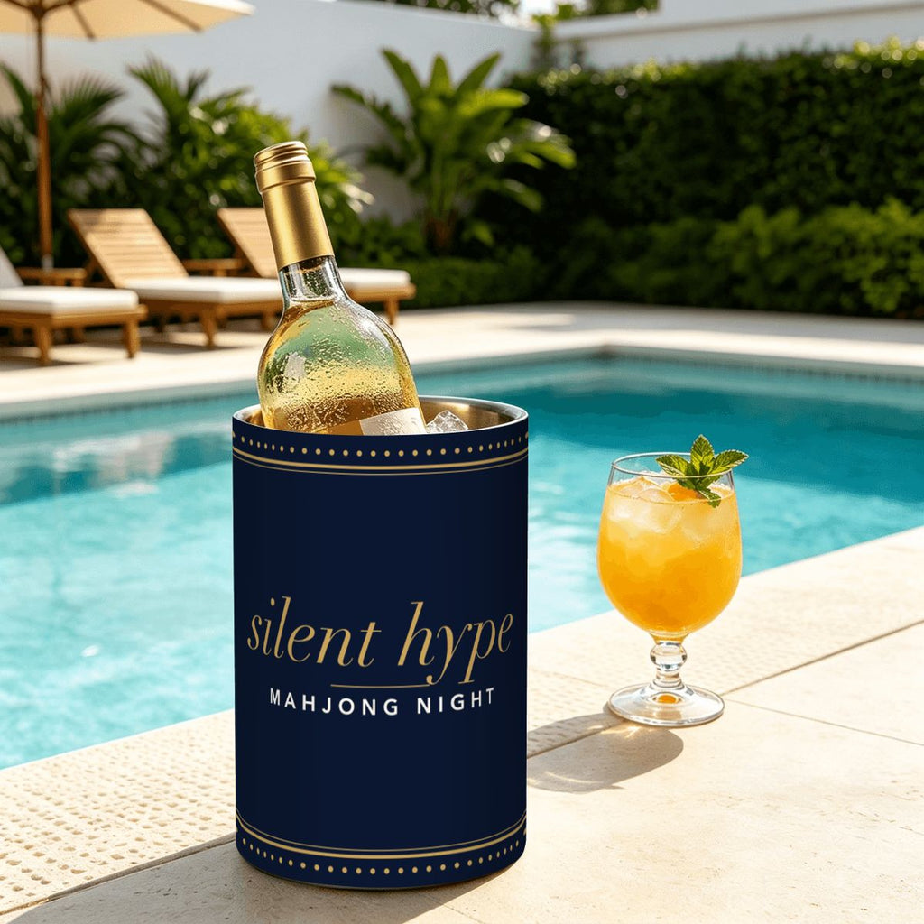 Navy wine chiller by a pool with a bottle of white wine